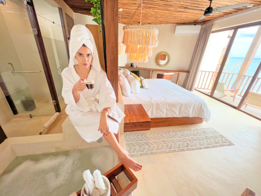 Clara on the private bathtub in the beachfront room at a top Tulum hotel