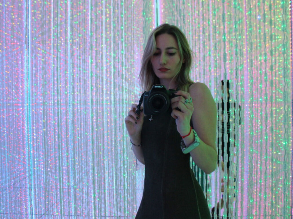 Travel Lemming Writer Sky taking a photo at a section in teamLab Planets Japan