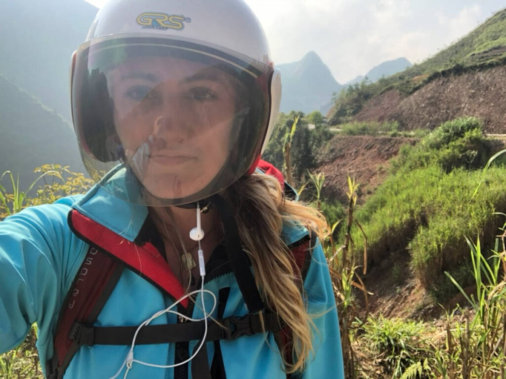 Travel Lemming Writer Sky Ariella taking a selfie while wearing her helmet