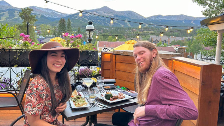 Travel Lemming Editor Abigail Bliss and her husband, posing for a photo at their dinner in downtown Breckenridge