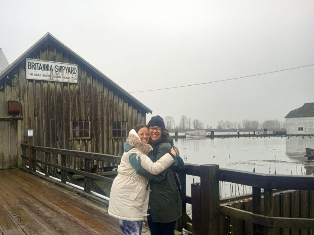 Travel Lemming author Catherine and her cousin hugging at Britannia Shipyard in Steveston