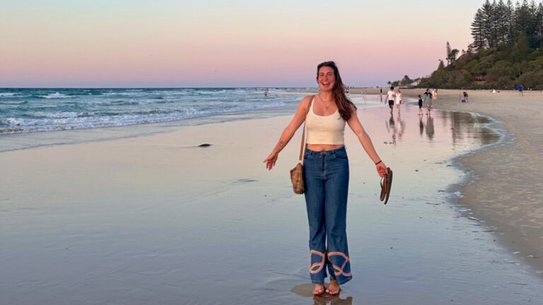Travel Lemming author Laura enjoying the beautiful beach in Coolangatta