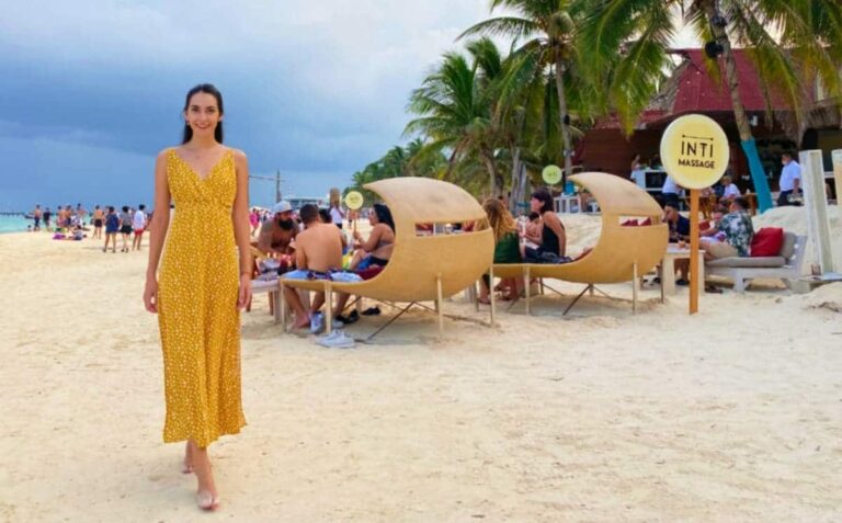 Travel Lemming writer Clara smiling for a photo at the Inti Beach Club