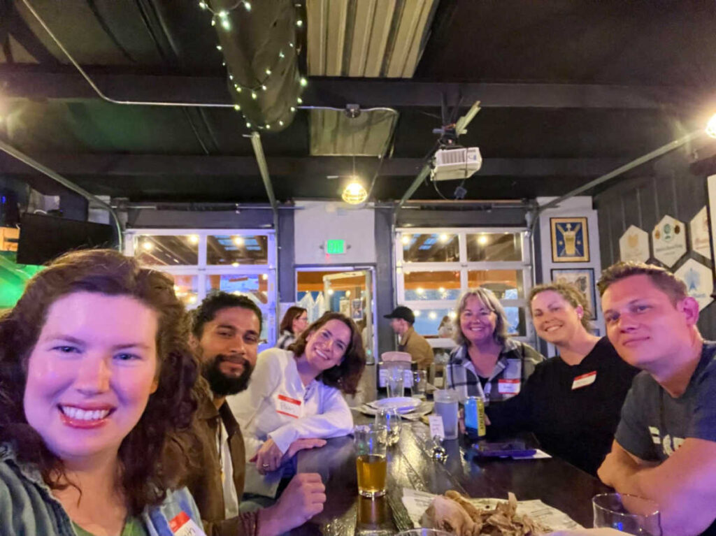 The author Elizabeth with other people at the Nashville Meetup of Travel Lemming