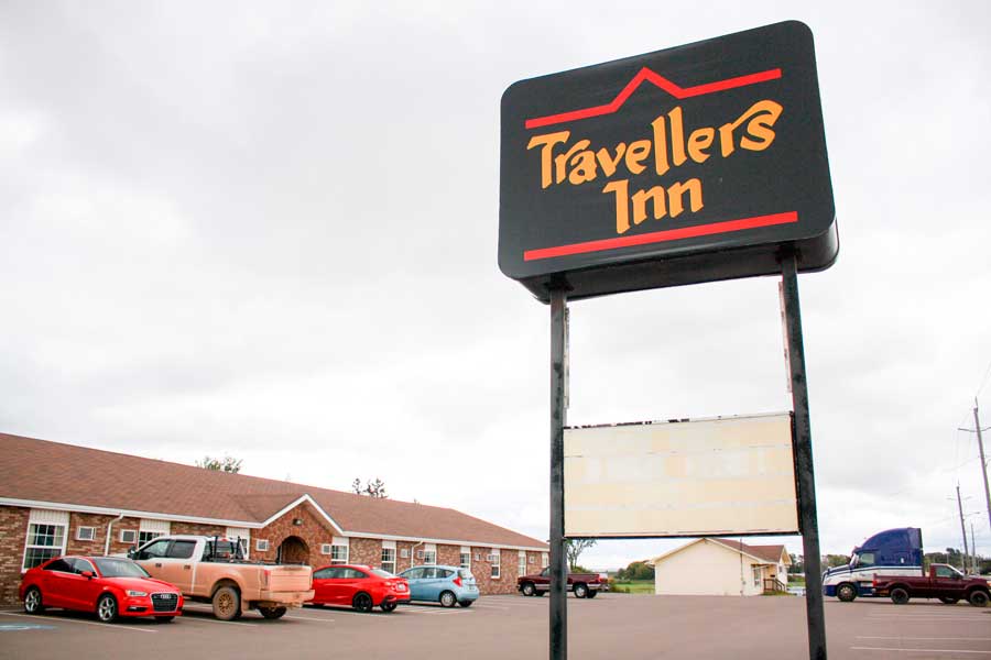 The Travellers Inn signage on the outside
