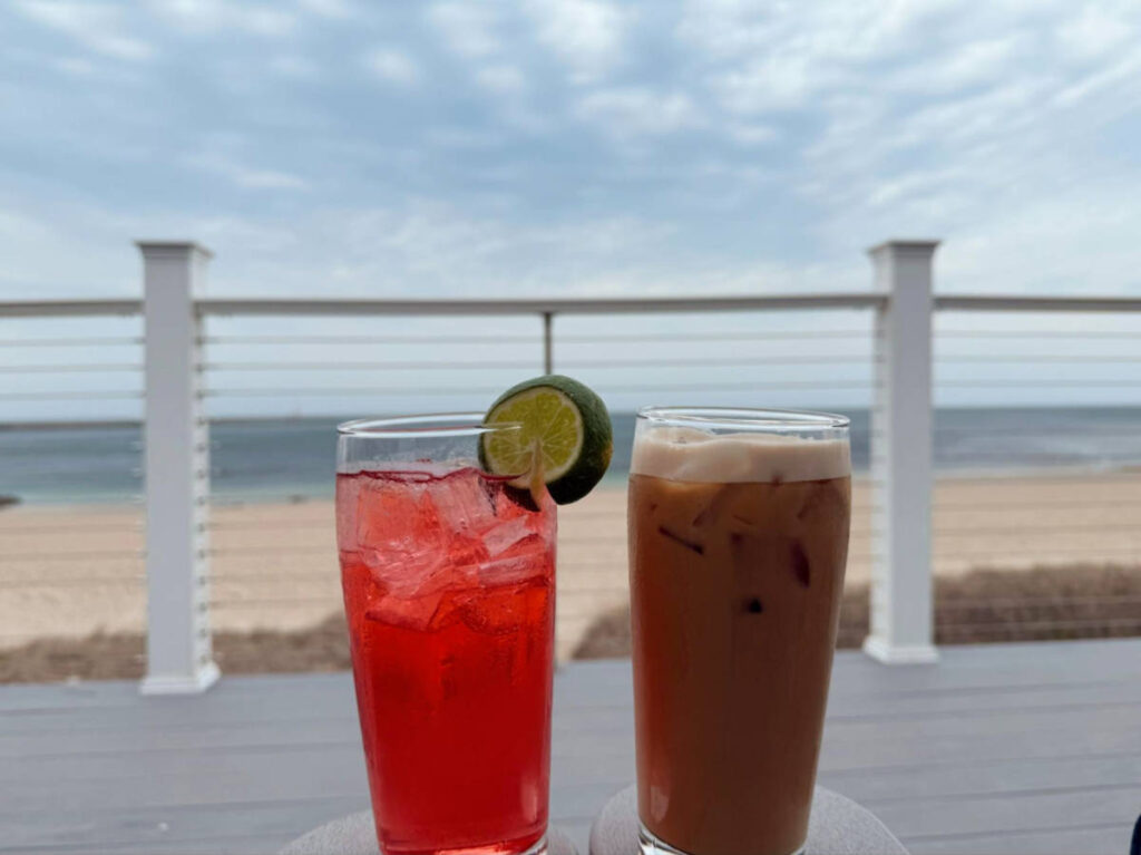 Two glasses of drinks at the back deck of Tree House Brewing