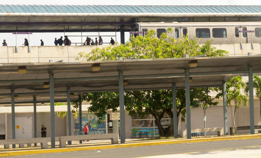 View of people and the train in a train station in Puerto Rico