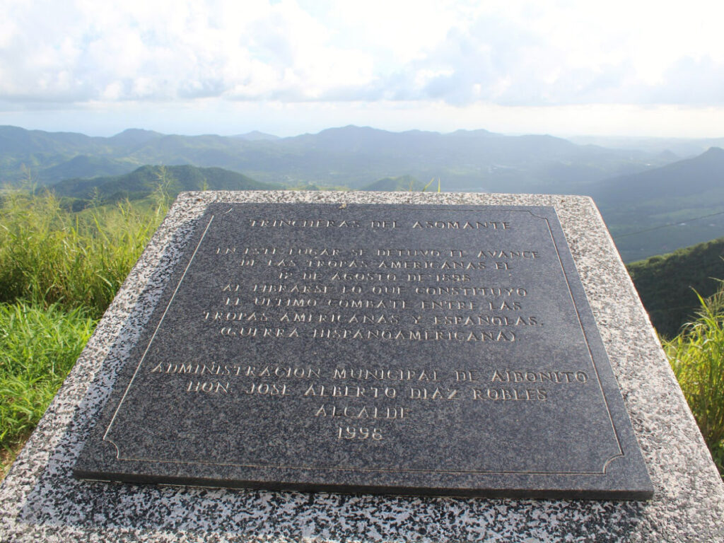 View of the Trinchera de Asomante Plaque with a view of the mountains