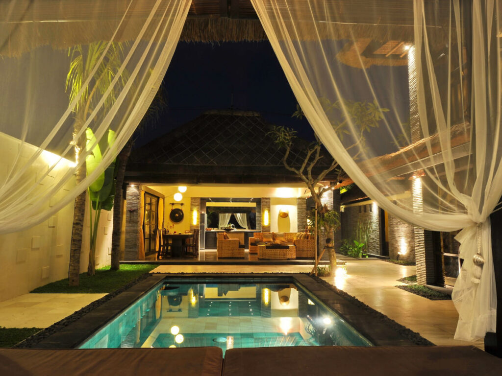 View of modern tropical villa with swimming pool in Bali
