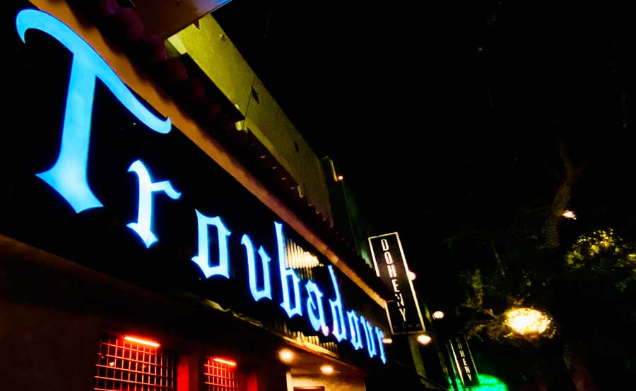 The illuminated Troubadour signage on the entrance