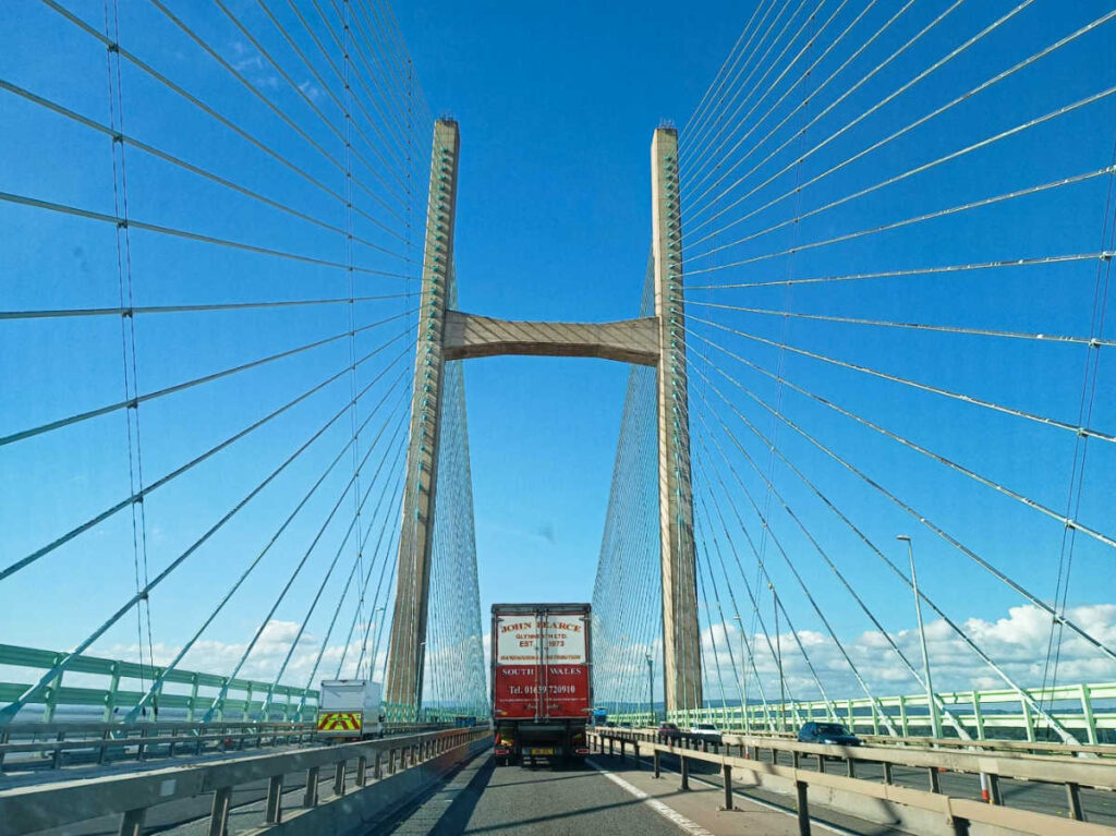 A truck driving along the Severn Bridge