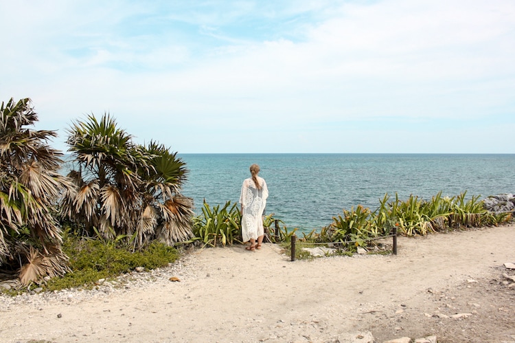 Taylor looks out over the ocean at the Tulum Ruins in Quintana Roo