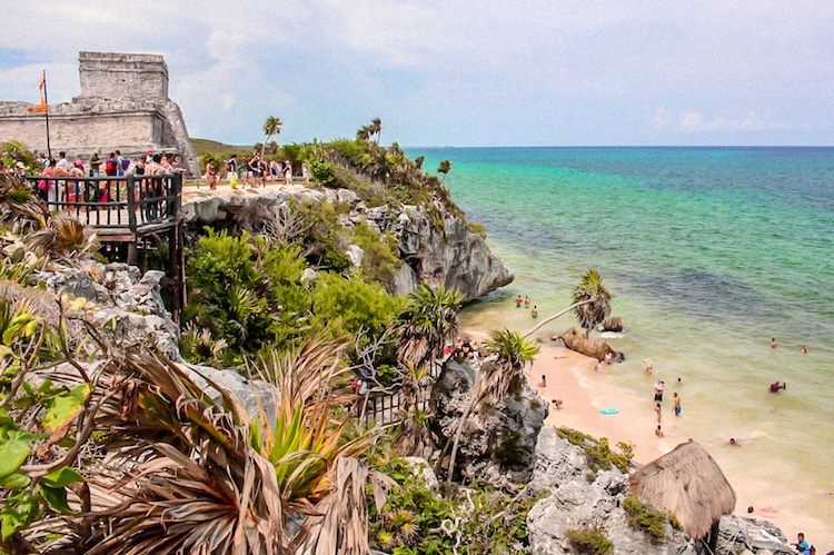 View of the Tulum ruins on the cliff overlooking the ocean