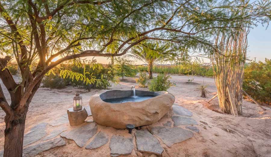 A hot spring beacons made with stone in Twentynine Palms
