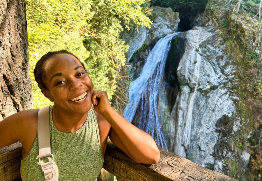 The author Chelsea Booker enjoys the view of Twin Falls from the lowest viewpoint
