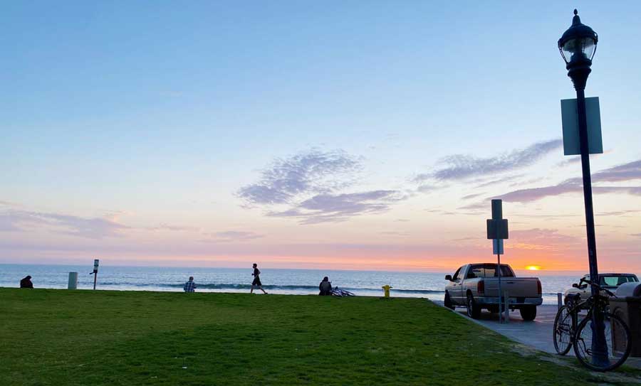 Colorful sunset and the grass field in Tyson Street Beach Park