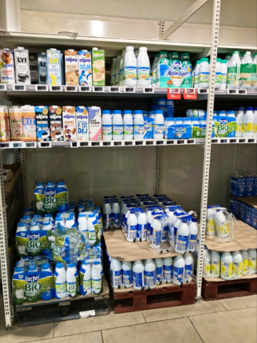 A display shelf full of UHT Milk