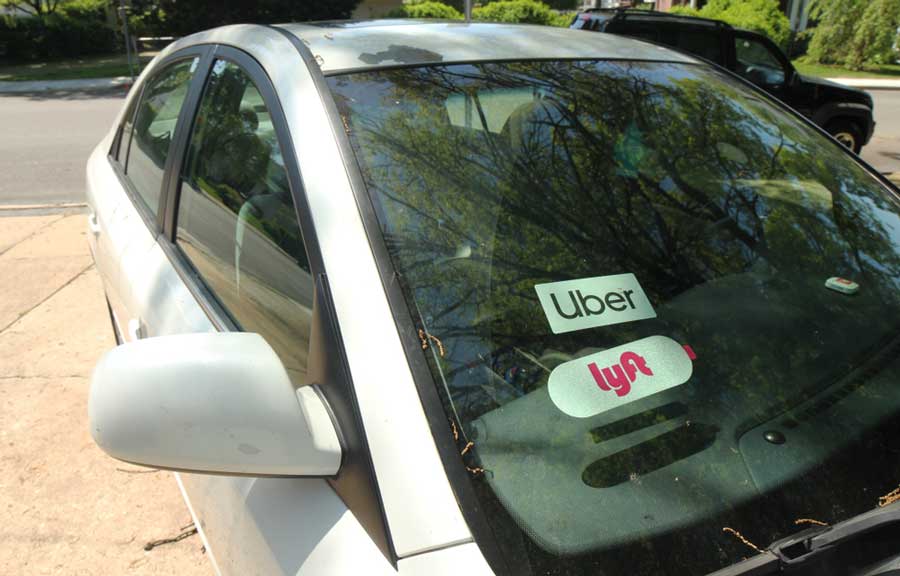 A car with an Uber sticker on it