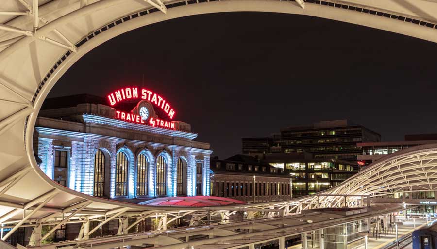 The illuminated Union Station sign at night