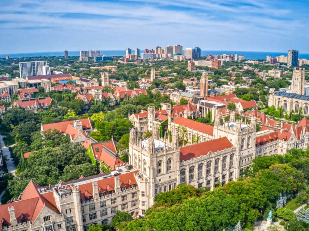 Aerial view of University of Chicago surrounded by greenery at Hyde Park