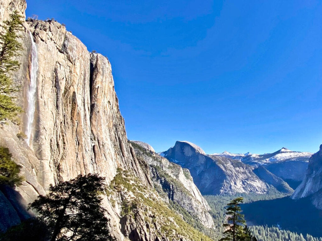 View of the Upper Yosemite Falls with the Half Dome in the background