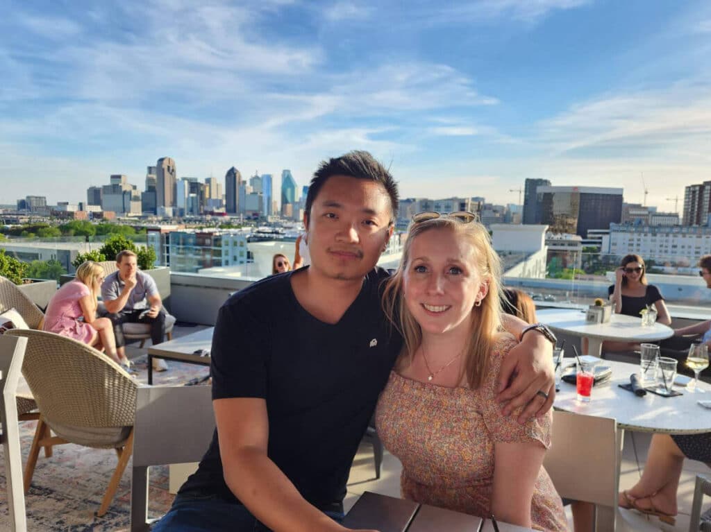 The author, Sarah Heath with her husband on a rooftop in Uptown