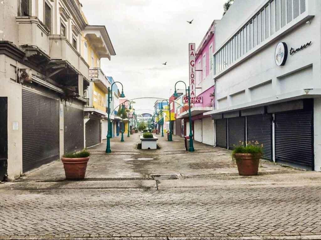 View of the closed buildings and empty street at Urbe Apie