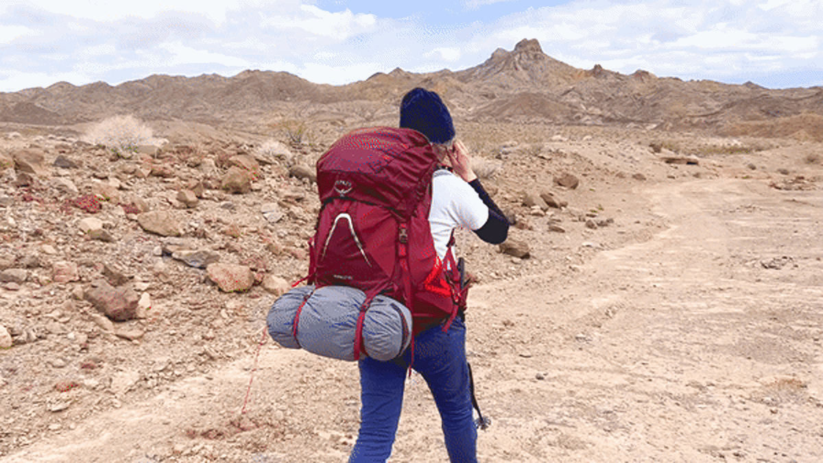 Skycie using the Osprey Aura AG LT during a hike