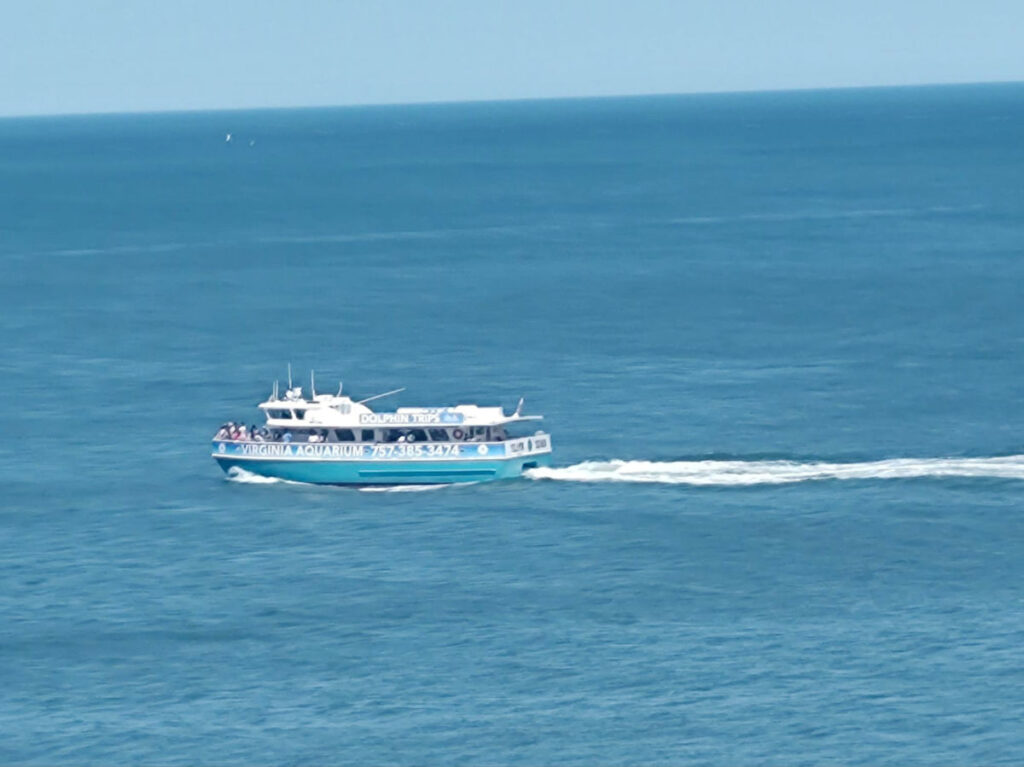 View of the VA Aquarium Dolphin sailing on the beach