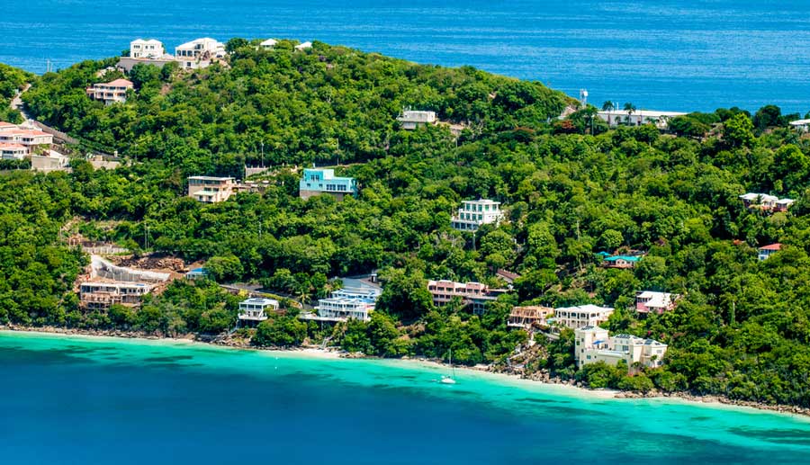 Aerial view of an island with private vacation rentals