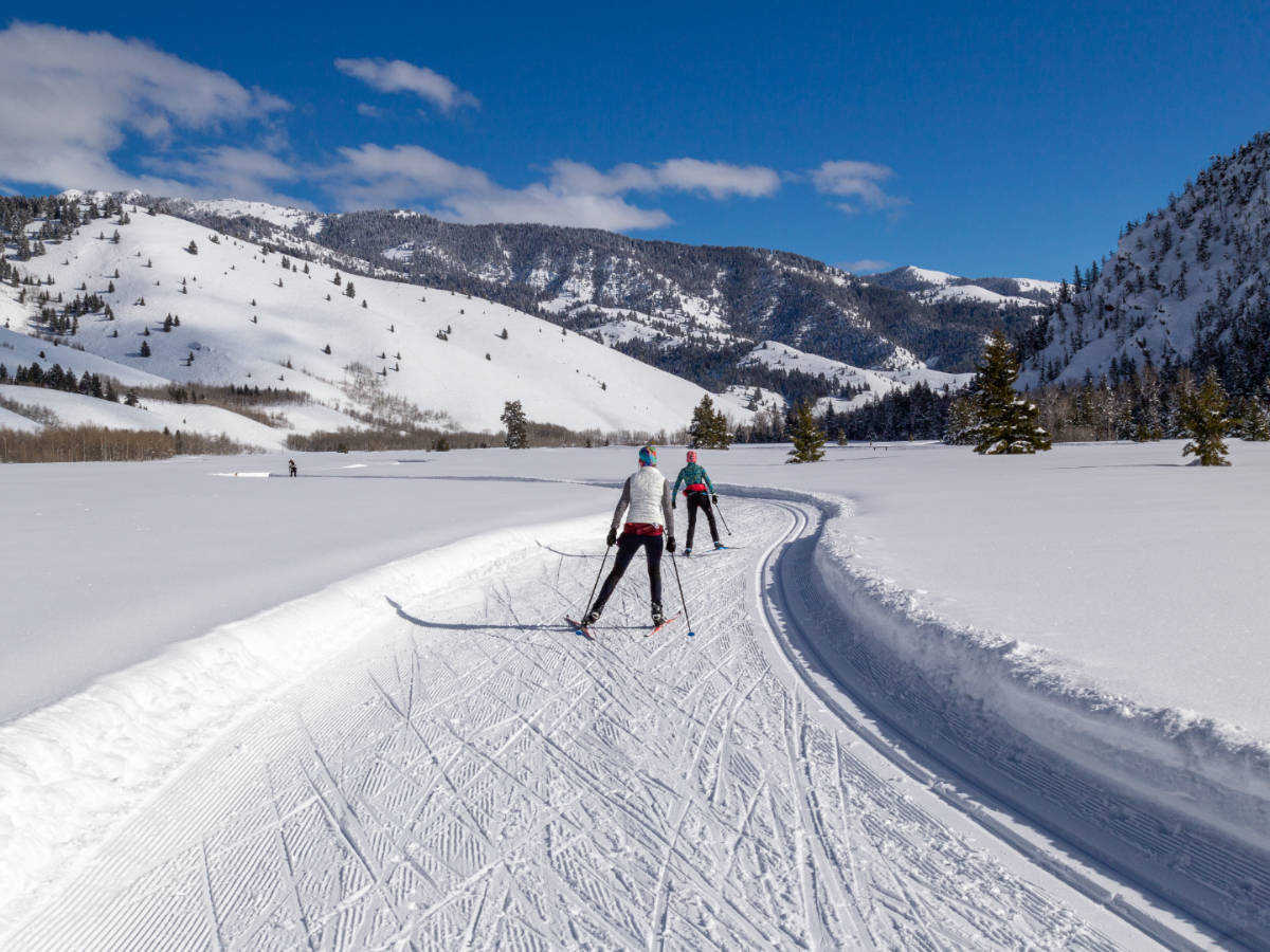 A woman cross-country skiing in Vail