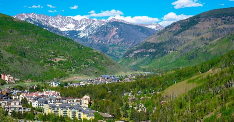 Overlooking view of ski resort town surrounded by greenery in Vail