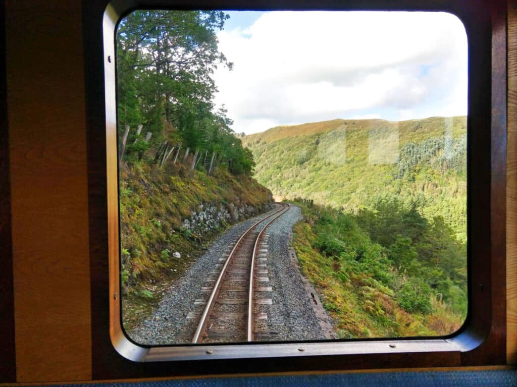 View of the scenery and Rheidol railway tracks from the train
