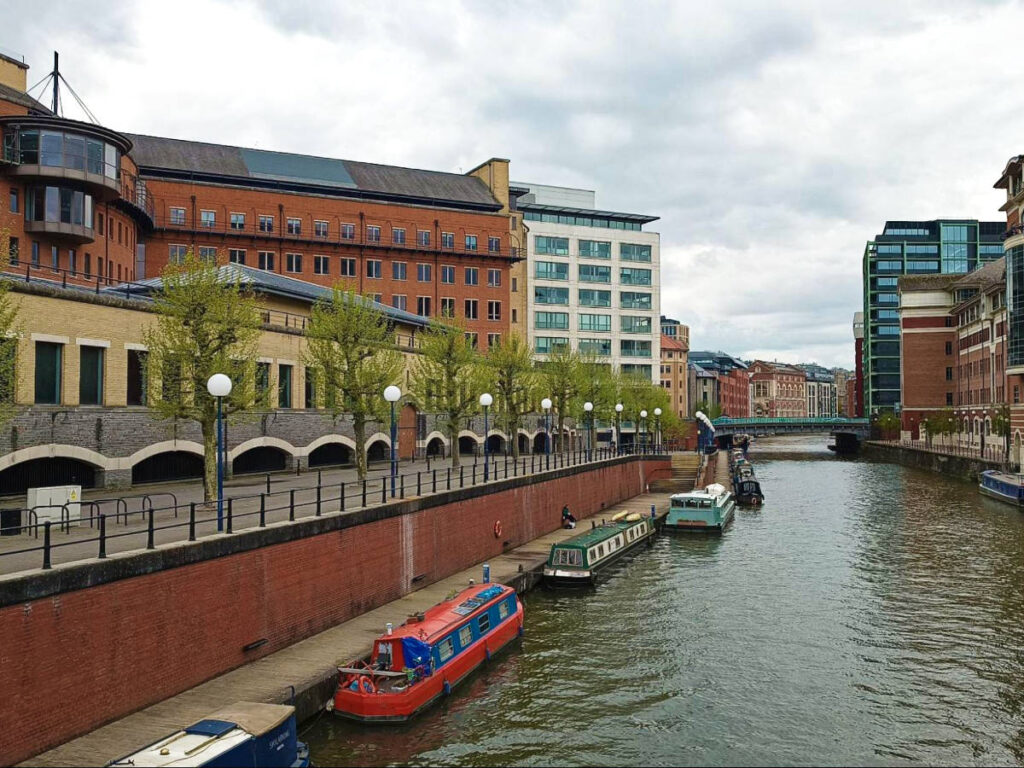 Overlooking view of the boats and the brick walled buildings from the Valentine Bridge