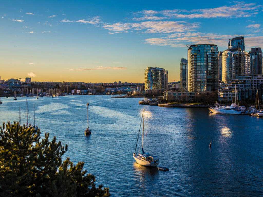 Aerial view of boats and buildings in Vancouver during sunset