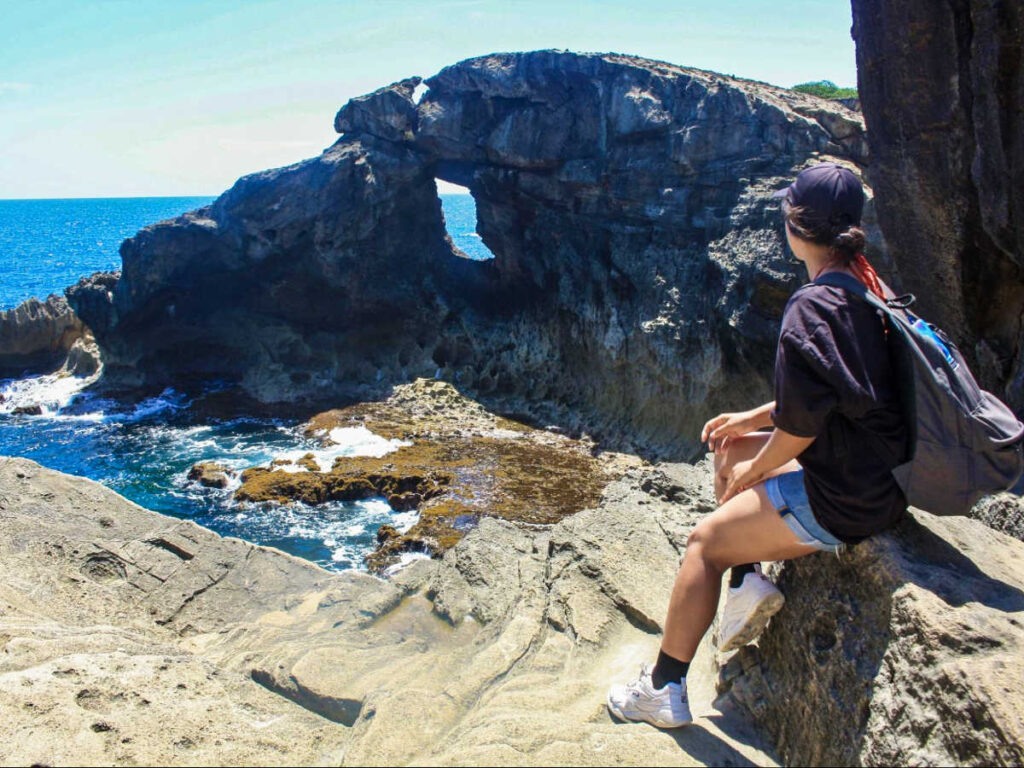 The author Vanessa Ramos, overlooking the Cueva del Indio from above