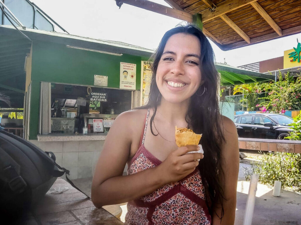 The author Vanessa Ramos eating in Piñones