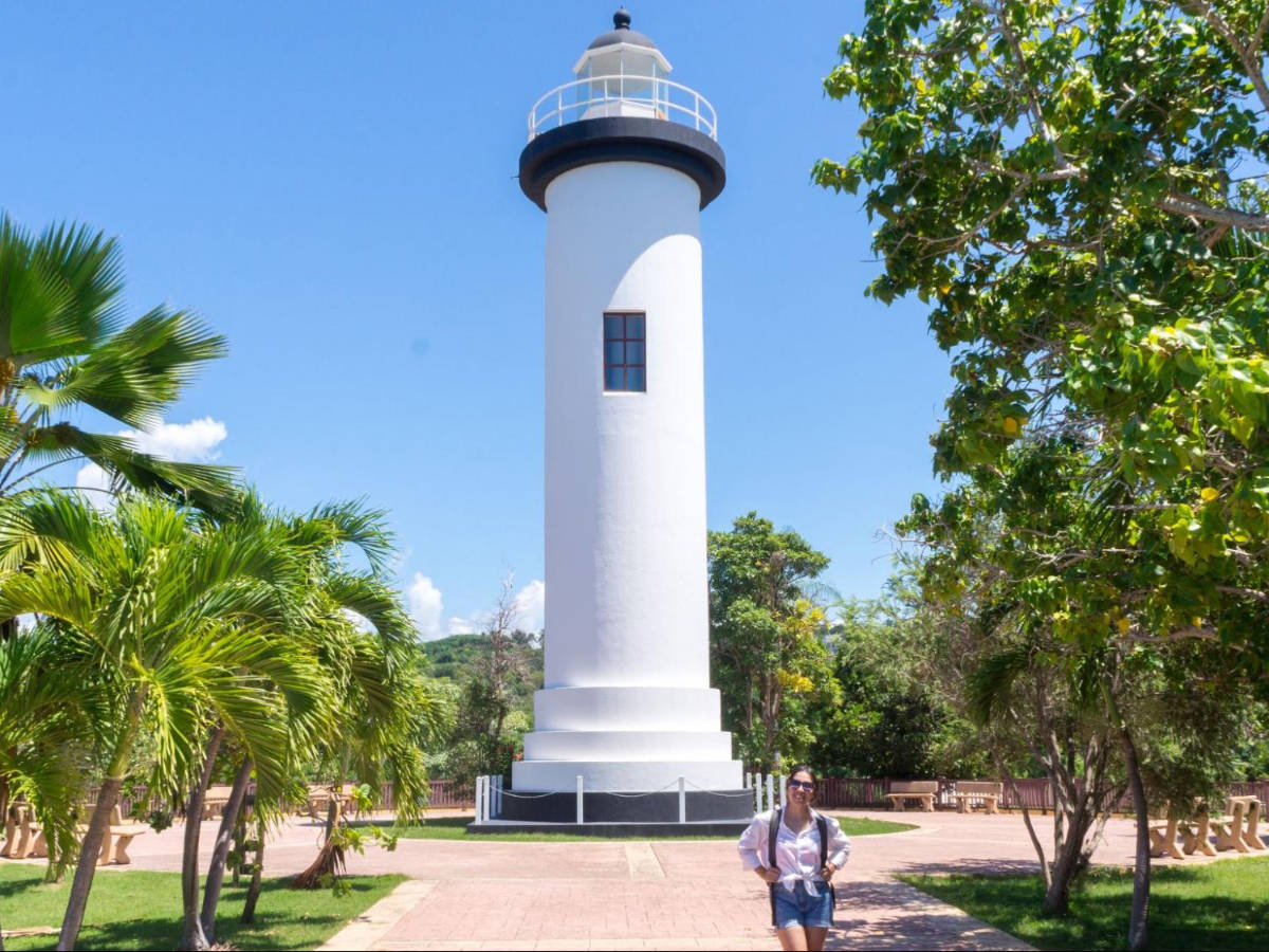 The author Vanessa Ramos in front of the Punta Higüera Lighthouse