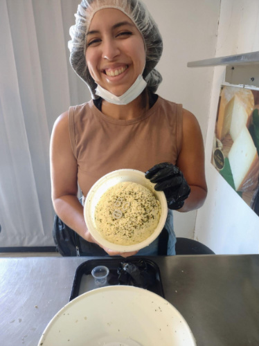 The author, Vanessa Ramos making her own cheese at Vaca Negra