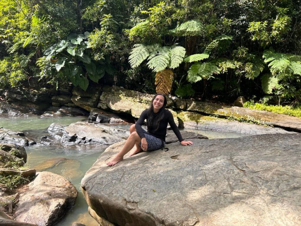 The author, Vanessa Ramos smiling for a photo in El Yunque