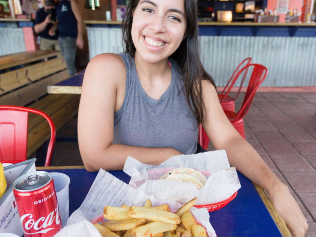 The author Vanessa Ramos eating in La Esperanza