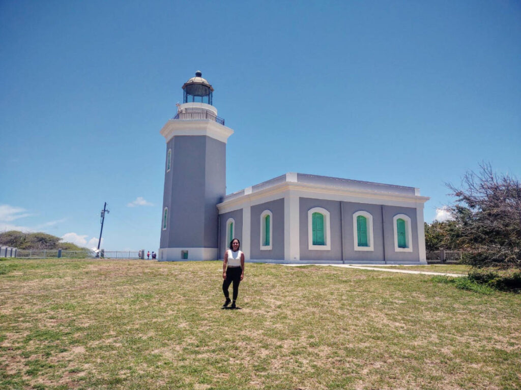 The author Vanessa Ramos in front of the Los Morrillos Lighthouse