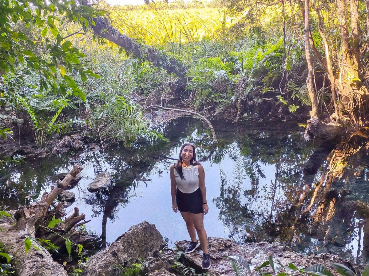 The author Vanessa Ramos smiling for a photo at the Manantial Guayaney