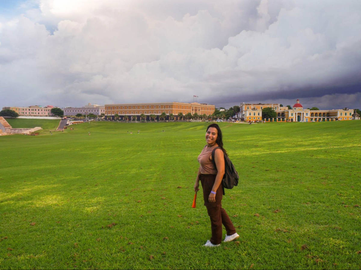The author Vanessa Ramos smiling for a photo in Old San Juan