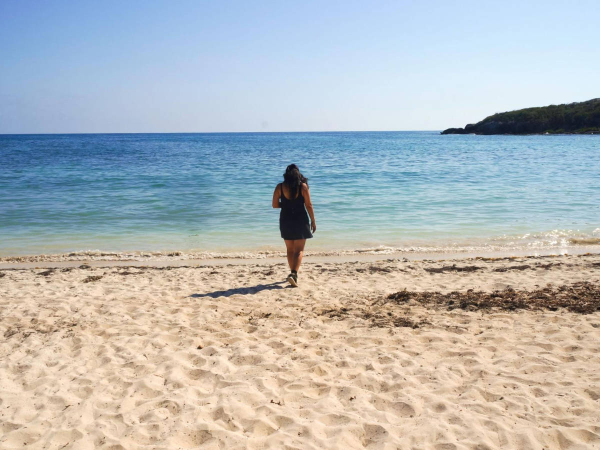 The author Vanessa Ramos enjoying her day on a beach in Vieques