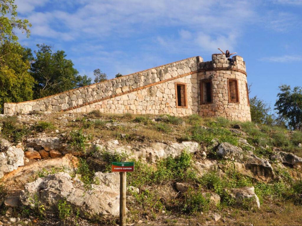 The author Vanessa Ramos posing on top of the ruins in Guánica Dry Forest