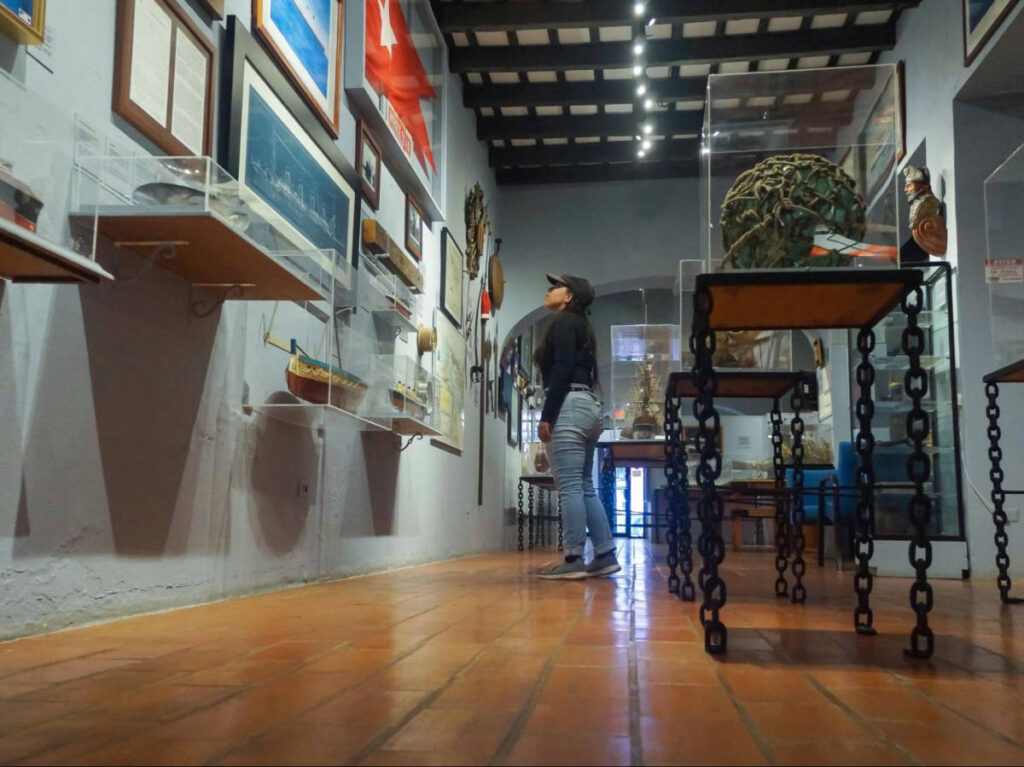 The author Vanessa Ramos admiring the art pieces inside Museo del Mar