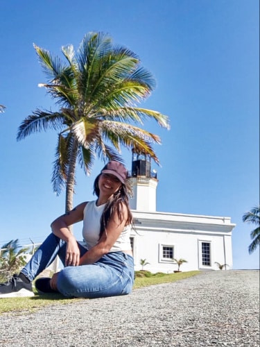 The author Vanessa Ramos, posing in front of the Punta Tuna Lighthouse