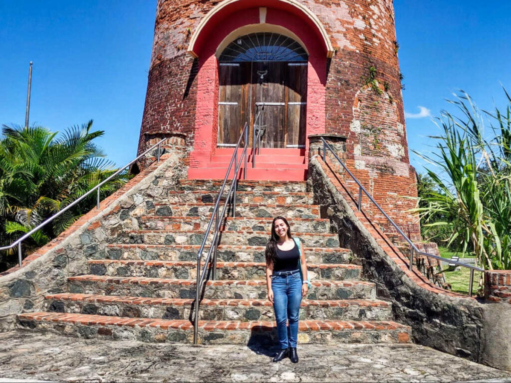 The author Vanessa Ramos, posing for a photo at the Ron del Barrilito