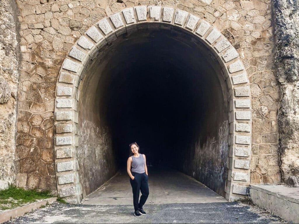 The author Vanessa Ramos, posing in front of Tunel Guajataca